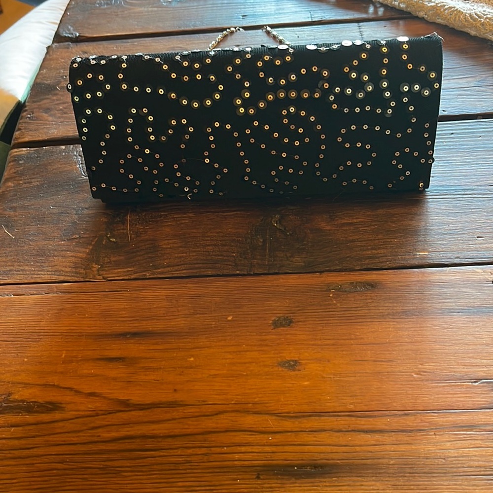Black sequinned clutch